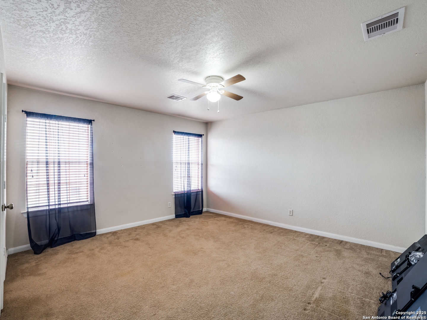 212 Springtree Trail Cibolo, TX 78108 - Photo 21 of 28 a view of an empty room with a window
