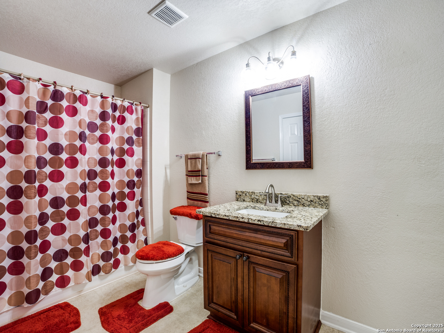 212 Springtree Trail Cibolo, TX 78108 - Photo 22 of 28 a bathroom with a sink toilet and shower