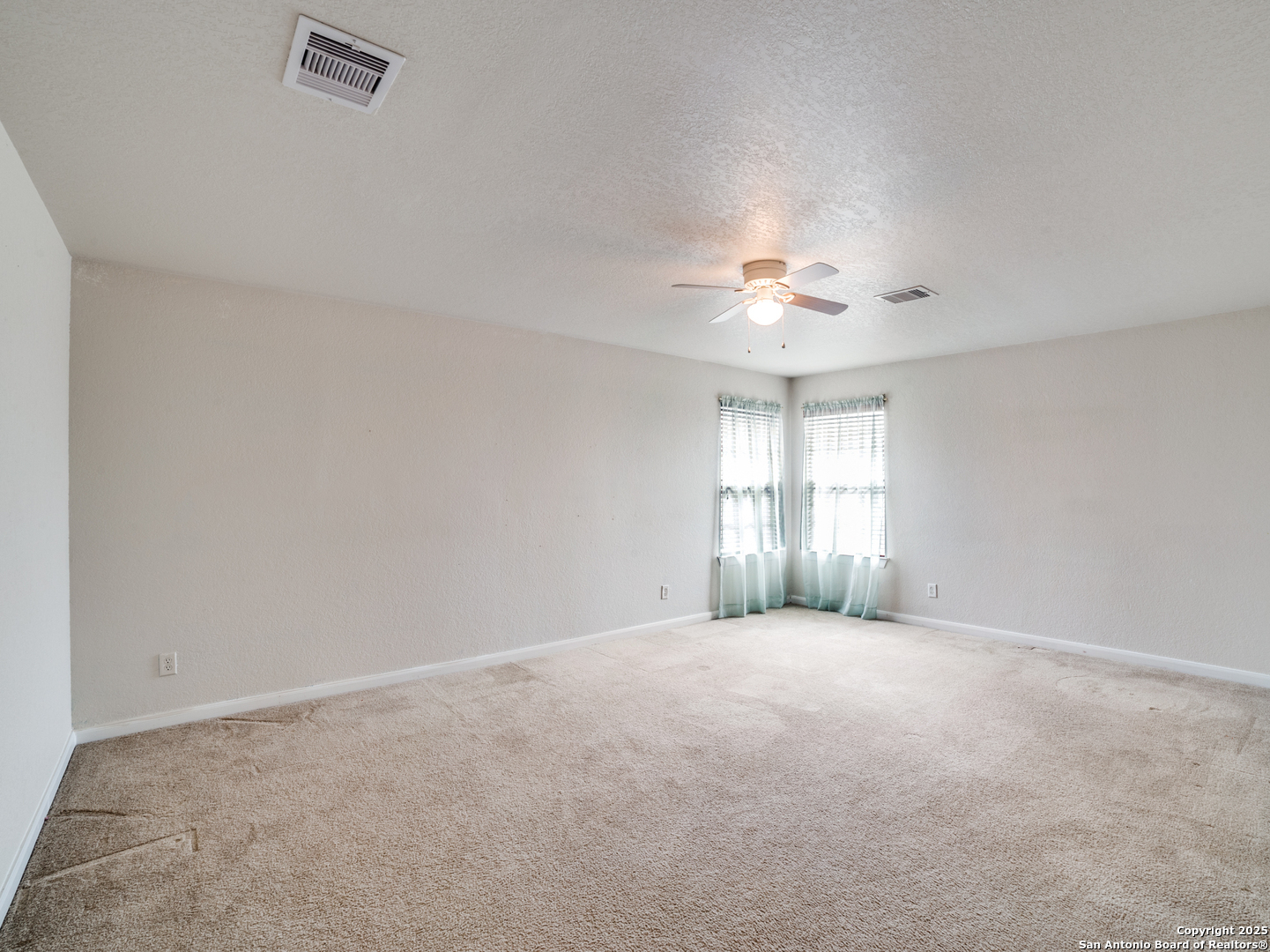 212 Springtree Trail Cibolo, TX 78108 - Photo 24 of 28 a view of a livingroom with a window