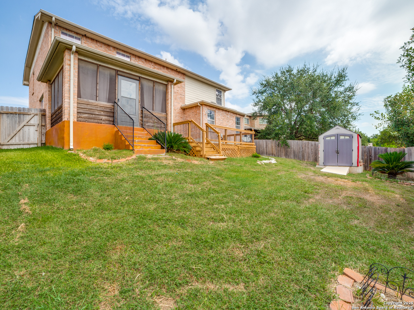 212 Springtree Trail Cibolo, TX 78108 - Photo 27 of 28 a view of a house with a yard
