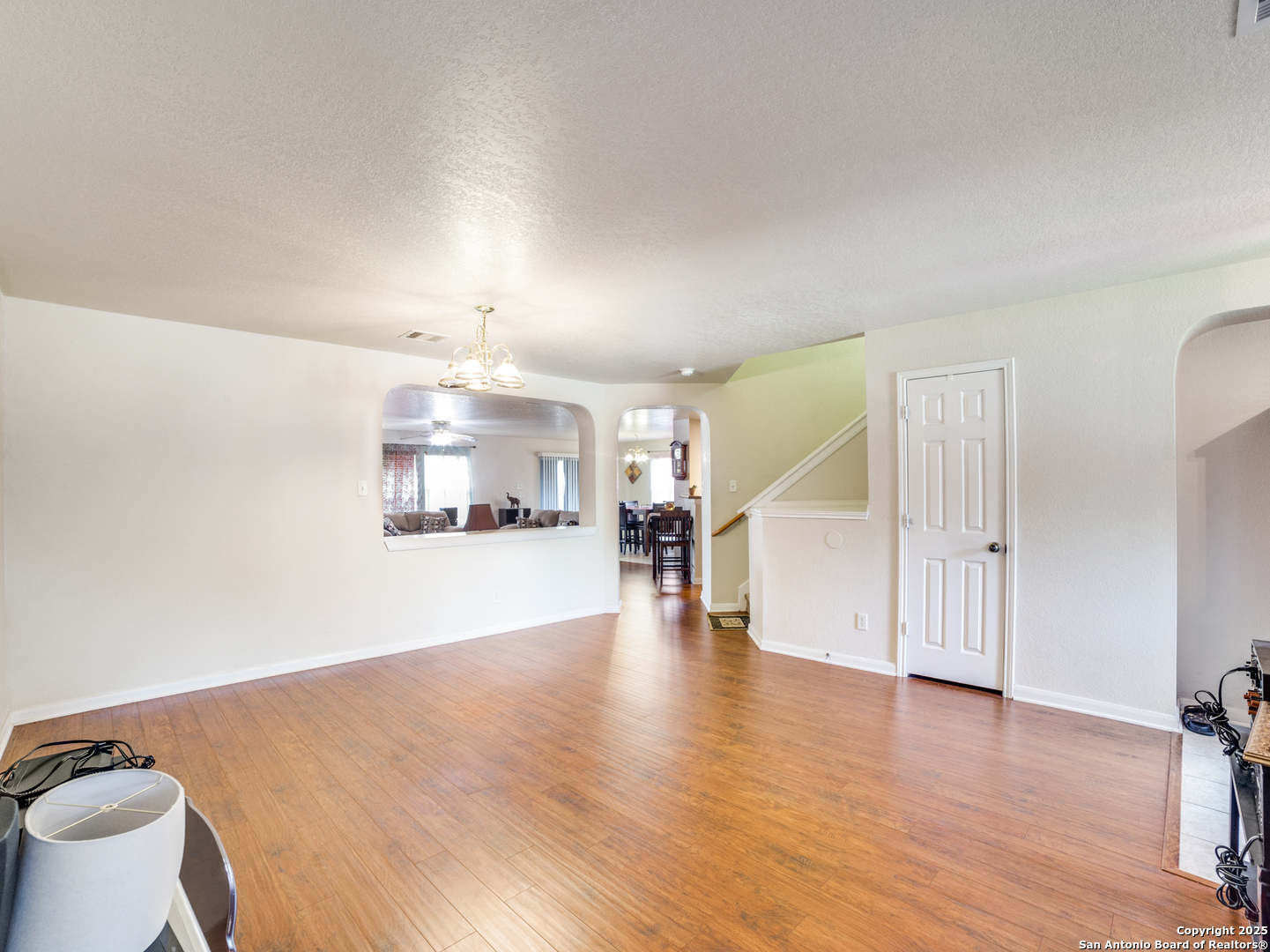 212 Springtree Trail Cibolo, TX 78108 - Photo 4 of 28 a view of a room wooden floor and a living room