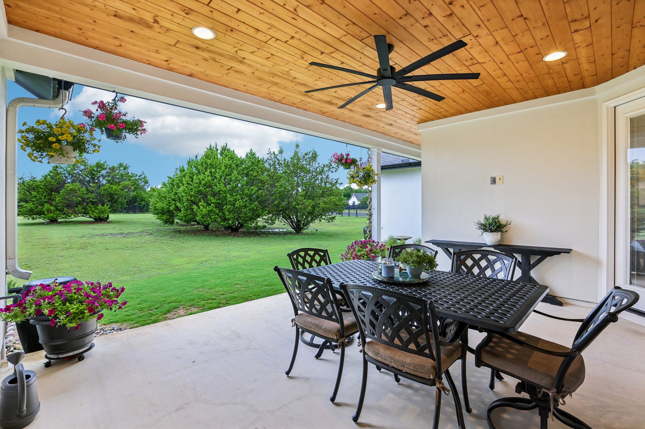 113 Crystal Lane Georgetown, TX 78633 - Photo 30 of 32 Unwind outdoors on the private patio, offering sweeping views of the lush, open grounds.
