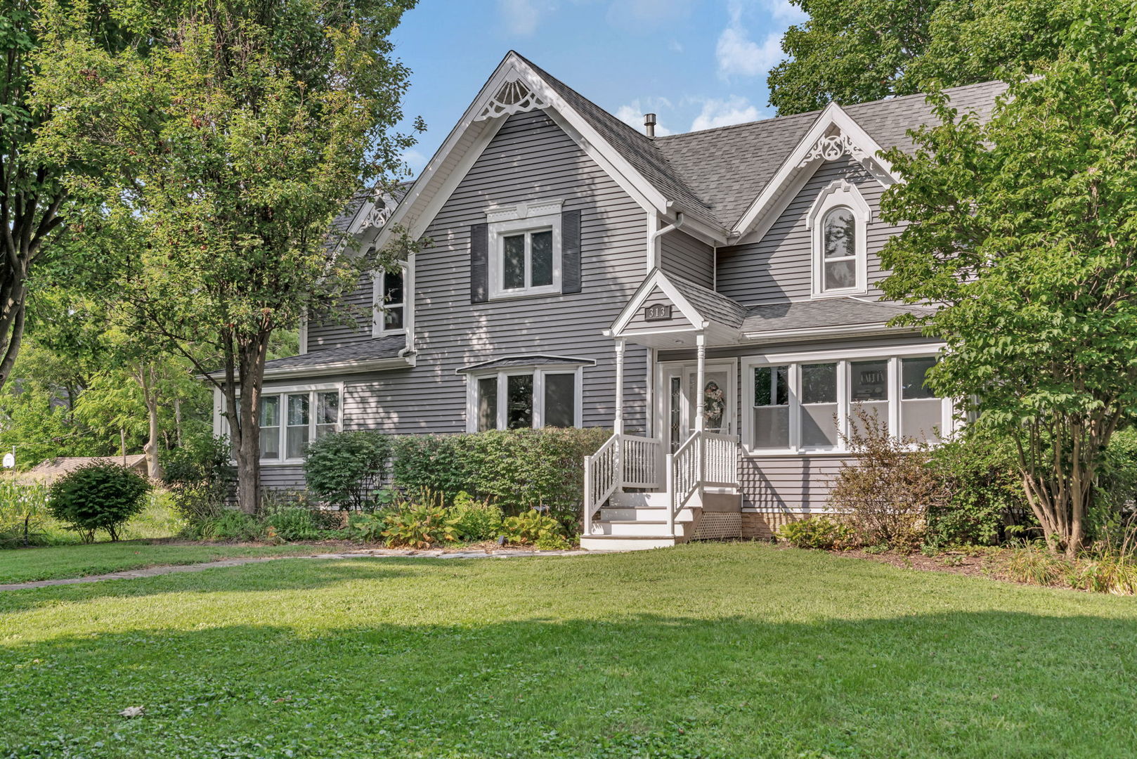 313 East George Street Odell, IL 60460 - Photo 1 of 44 a front view of a house with a yard
