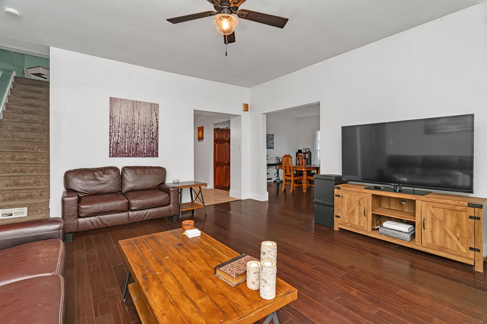 313 East George Street Odell, IL 60460 - Photo 18 of 44 a living room with furniture and a flat screen tv