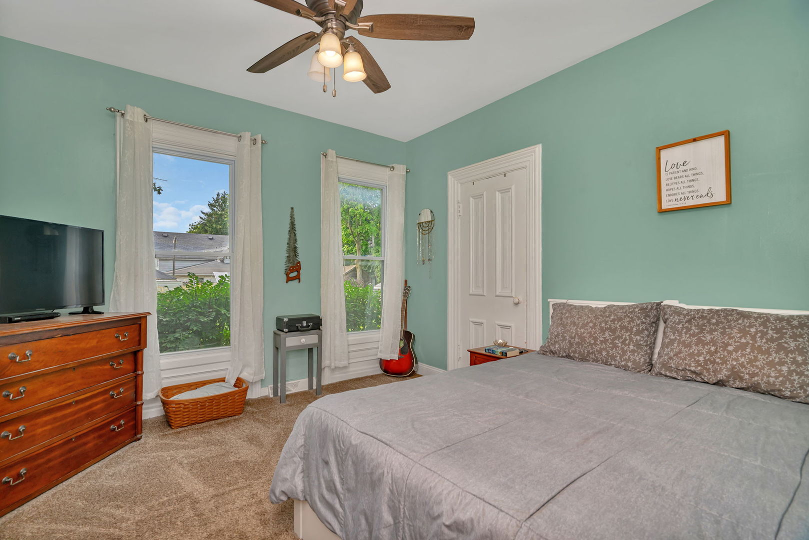 313 East George Street Odell, IL 60460 - Photo 28 of 44 a bedroom with a bed and a flat screen tv