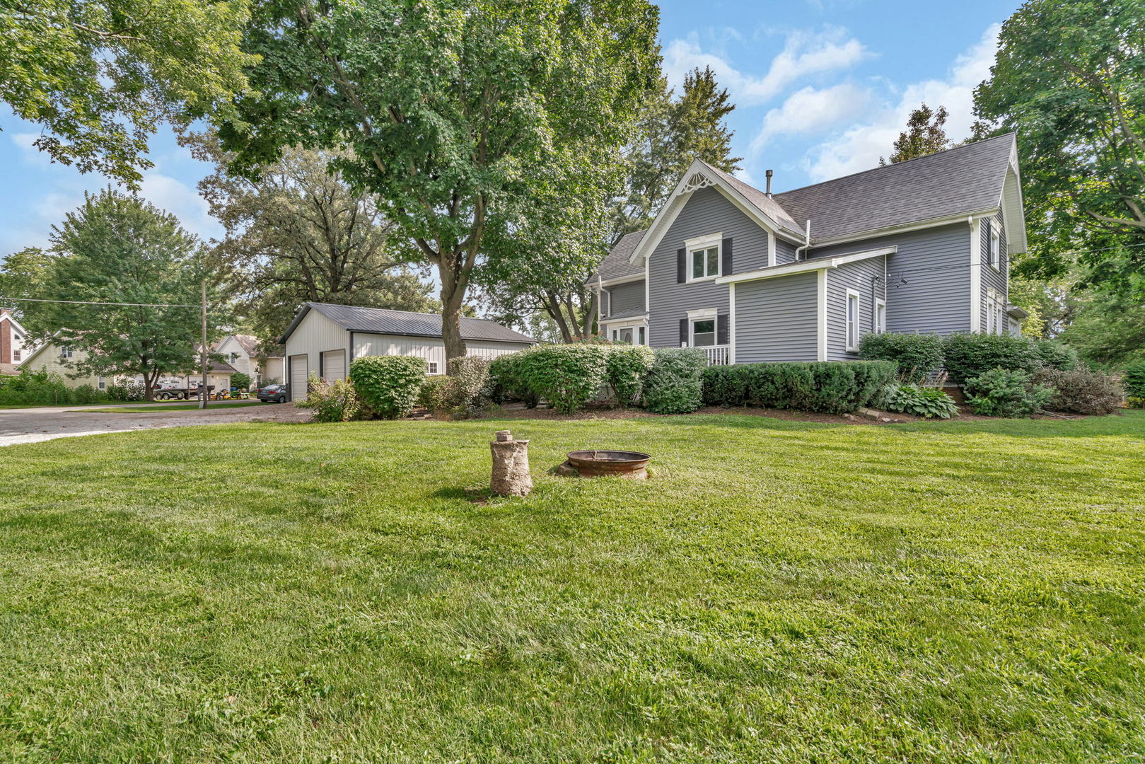 313 East George Street Odell, IL 60460 - Photo 4 of 44 a house view with swimming pool in front of it