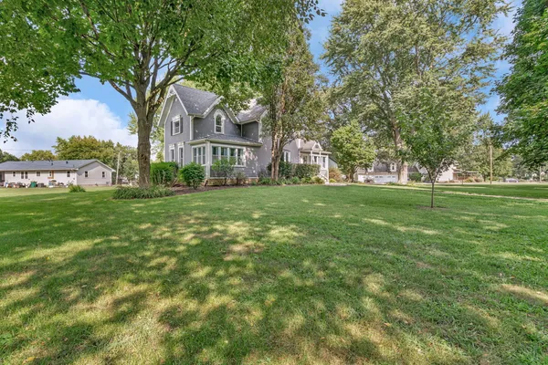 a view of a house with a big yard