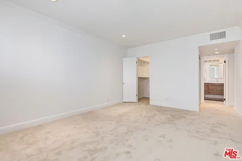 an empty room with an entryway