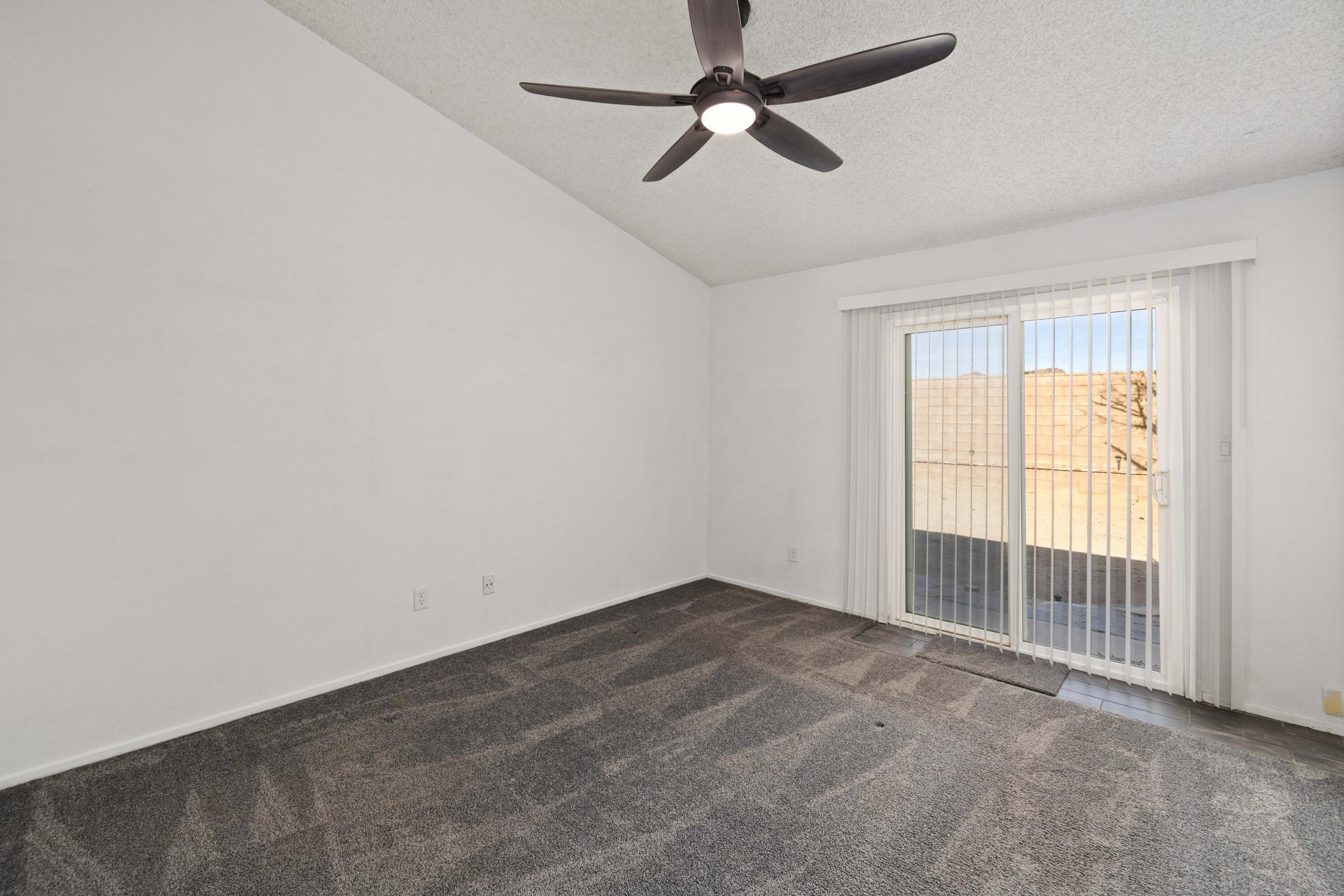 3043 Echo Drive Rosamond, CA 93560 - Photo 12 of 24 an empty room with a window