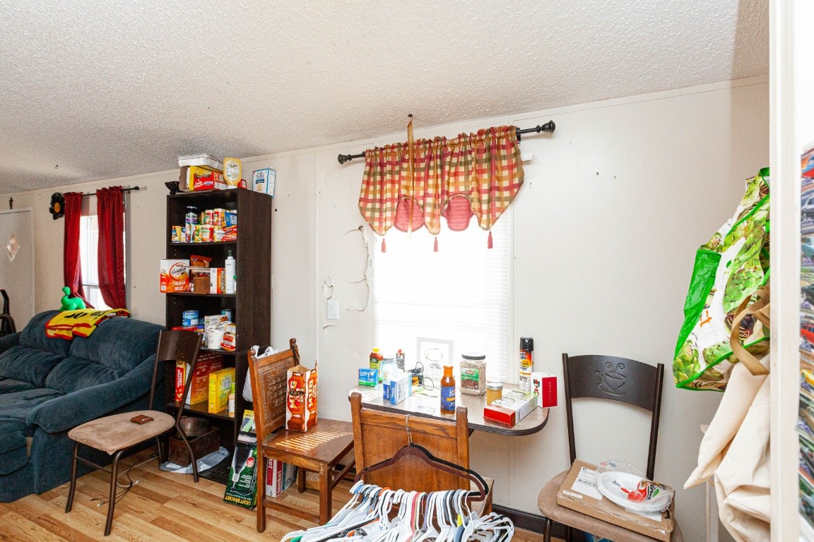 9312 Missionary Ridge Road Bon Aqua, TN 37025 - Photo 17 of 42 a living room with furniture a rug and a large window