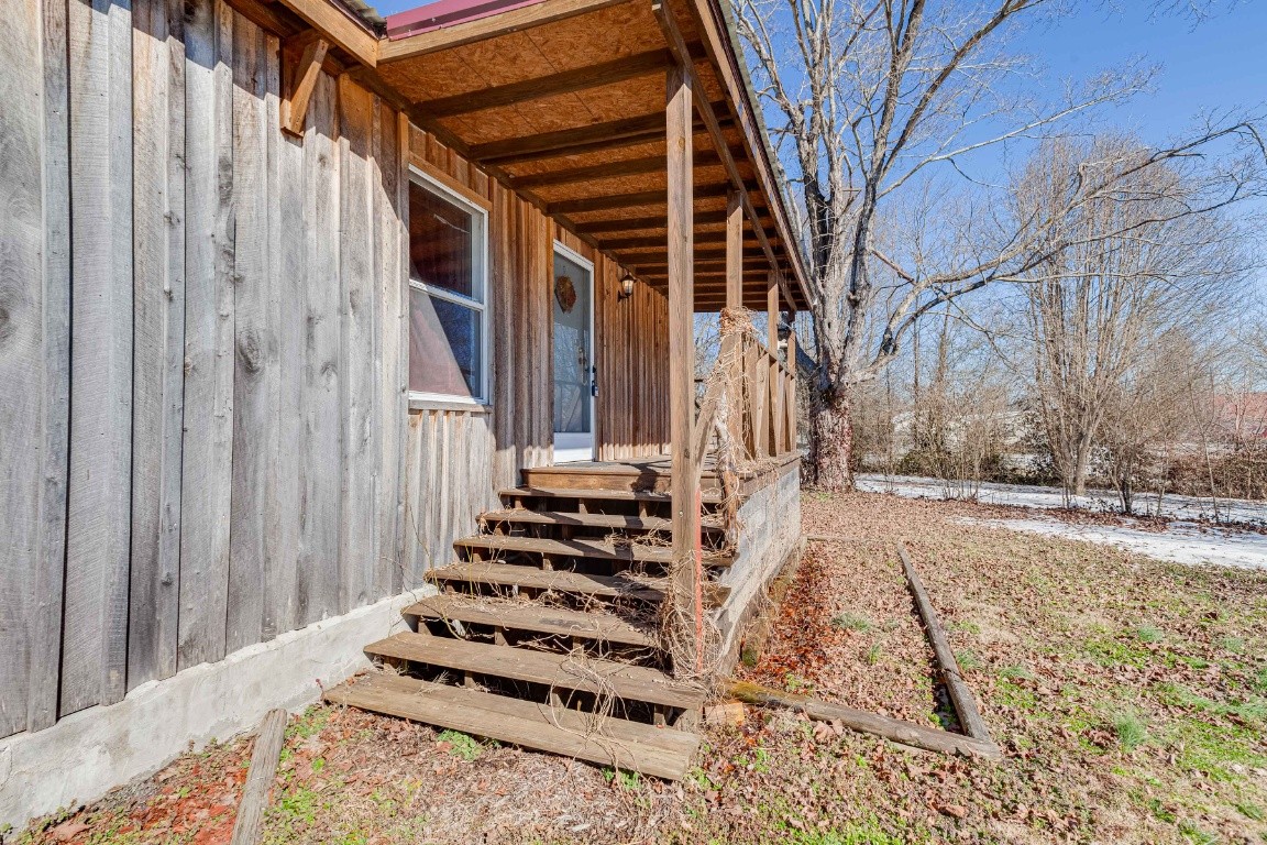 9312 Missionary Ridge Road Bon Aqua, TN 37025 - Photo 26 of 42 a view of a house with a yard