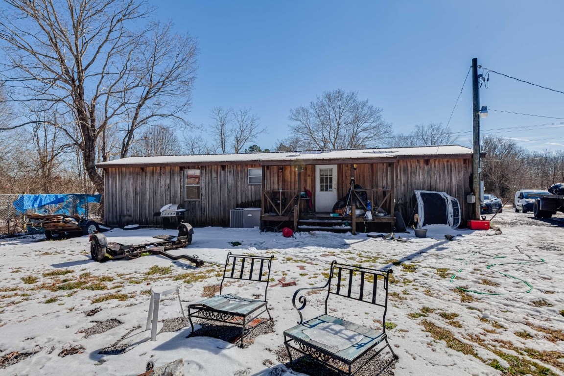 9312 Missionary Ridge Road Bon Aqua, TN 37025 - Photo 28 of 42 a view of backyard with patio