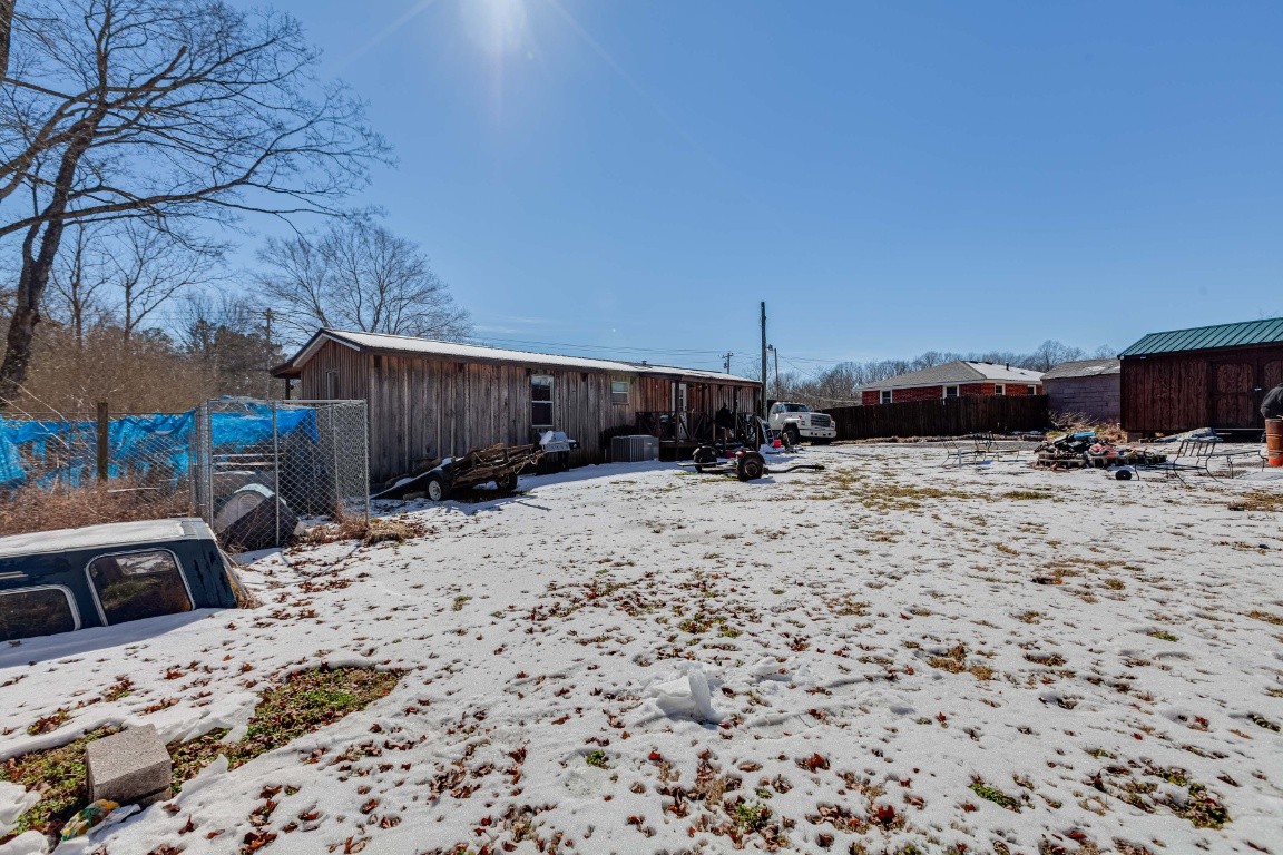 9312 Missionary Ridge Road Bon Aqua, TN 37025 - Photo 30 of 42 a view of a backyard of a house