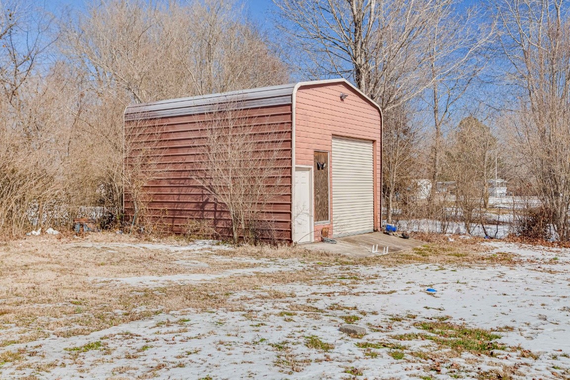 9312 Missionary Ridge Road Bon Aqua, TN 37025 - Photo 35 of 42 a view of a backyard of the house