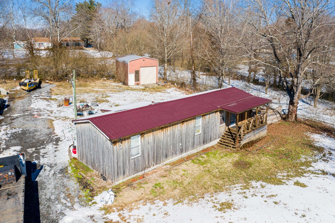 9312 Missionary Ridge Road Bon Aqua, TN 37025 - Photo 40 of 42 a view of a house with a wooden fence