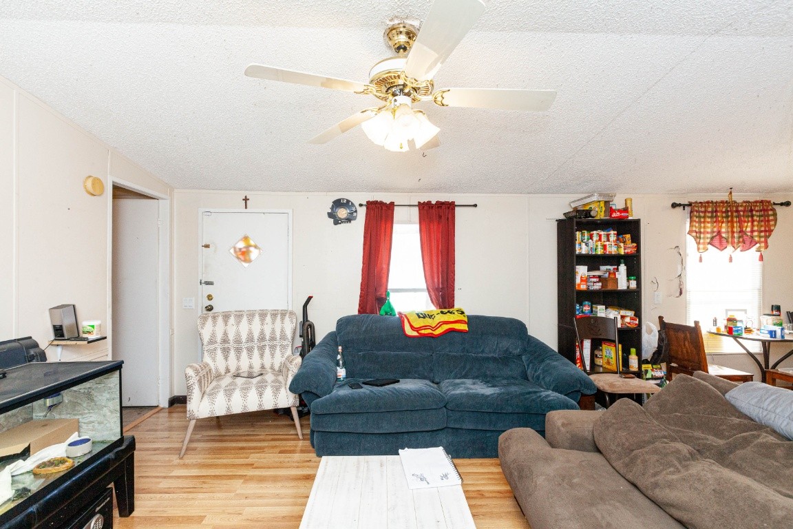 9312 Missionary Ridge Road Bon Aqua, TN 37025 - Photo 9 of 42 a living room with furniture and a window