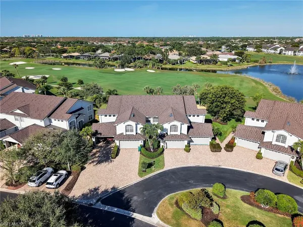 an aerial view of a house with a garden