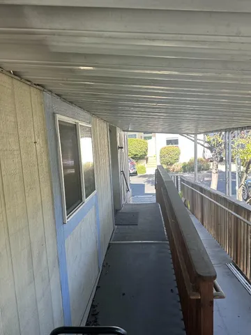 a view of a porch with furniture