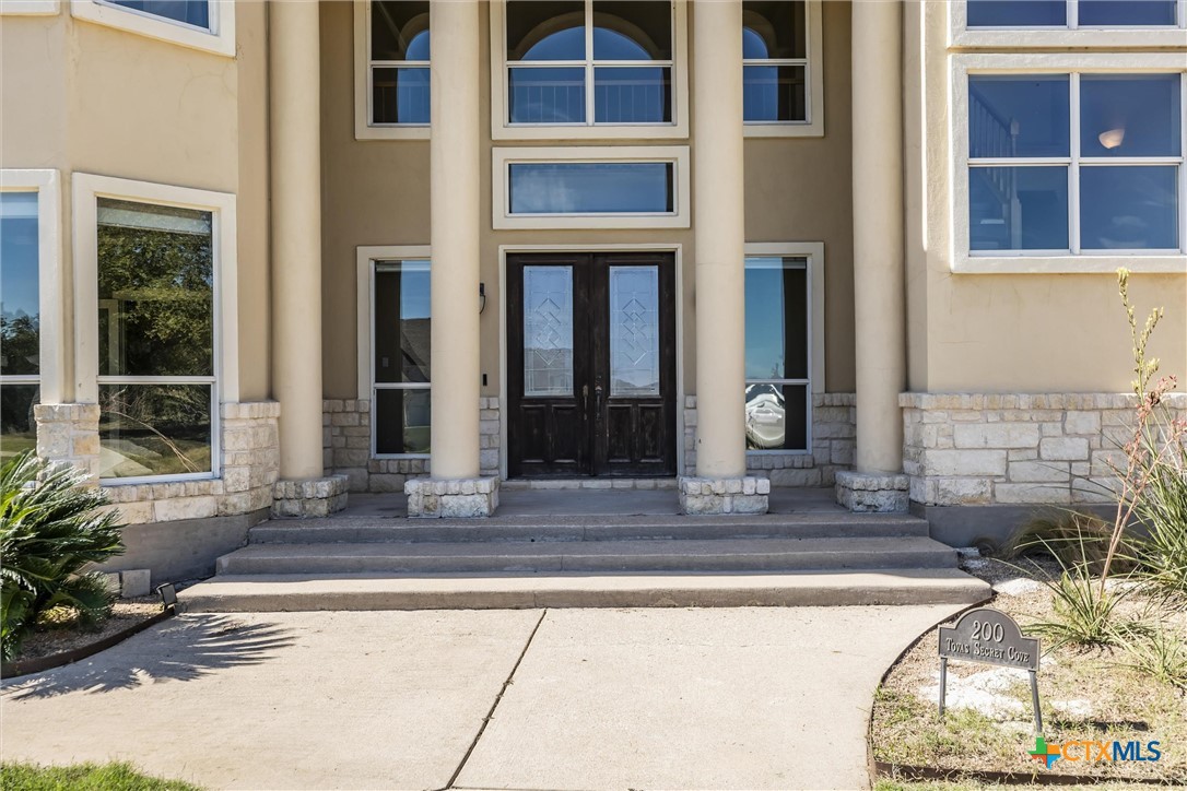 200 Tovas Secret Cove Georgetown, TX 78628 - Photo 5 of 31 a view of a building entrance