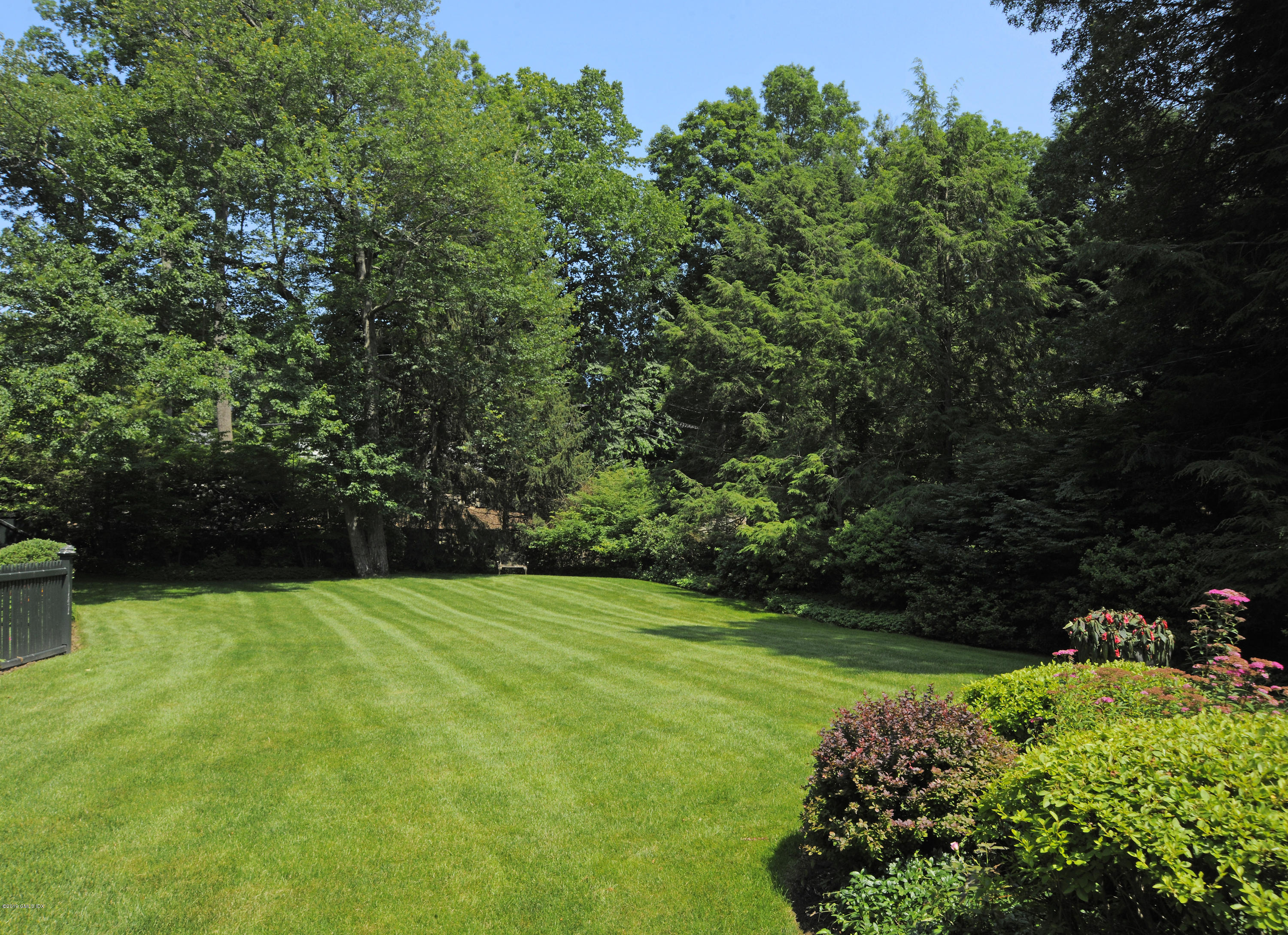 35 Copper Beech Road Greenwich, CT 06830 - Photo 20 of 26 a view of a garden