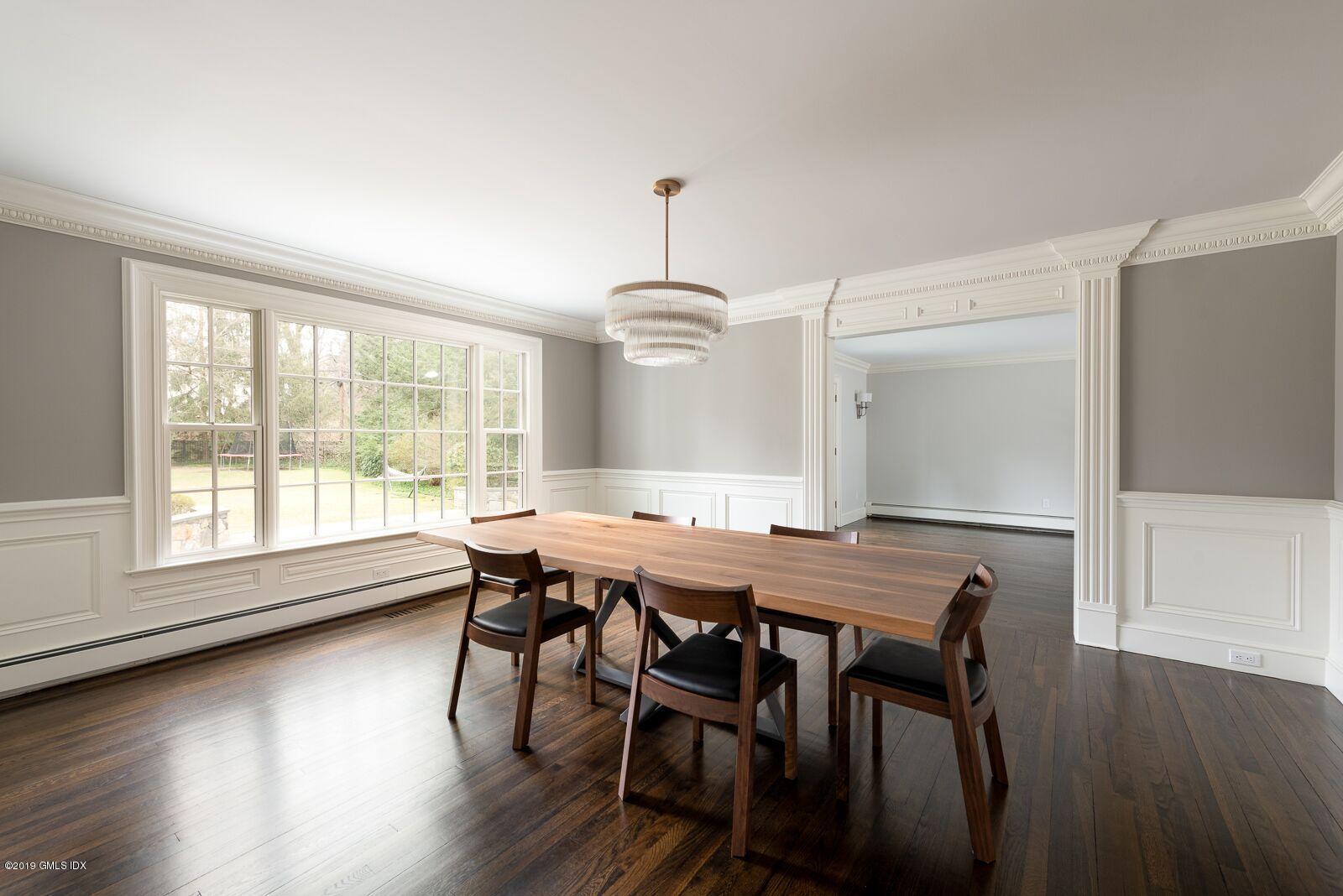 35 Copper Beech Road Greenwich, CT 06830 - Photo 7 of 26 a view of a dining room with furniture window and wooden floor