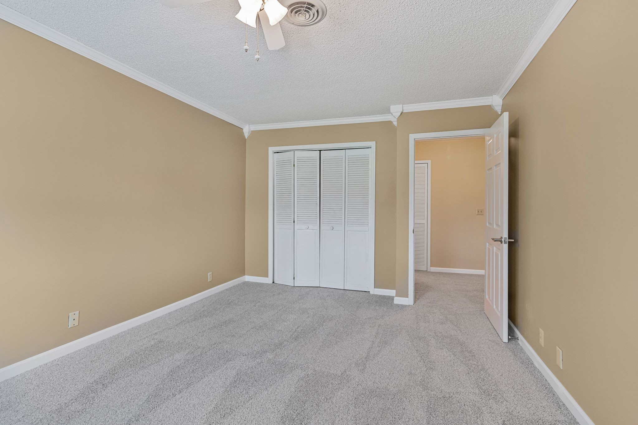 460 West Campbell Road Goodlettsville, TN 37072 - Photo 12 of 55 a view of an empty room with a chandelier fan