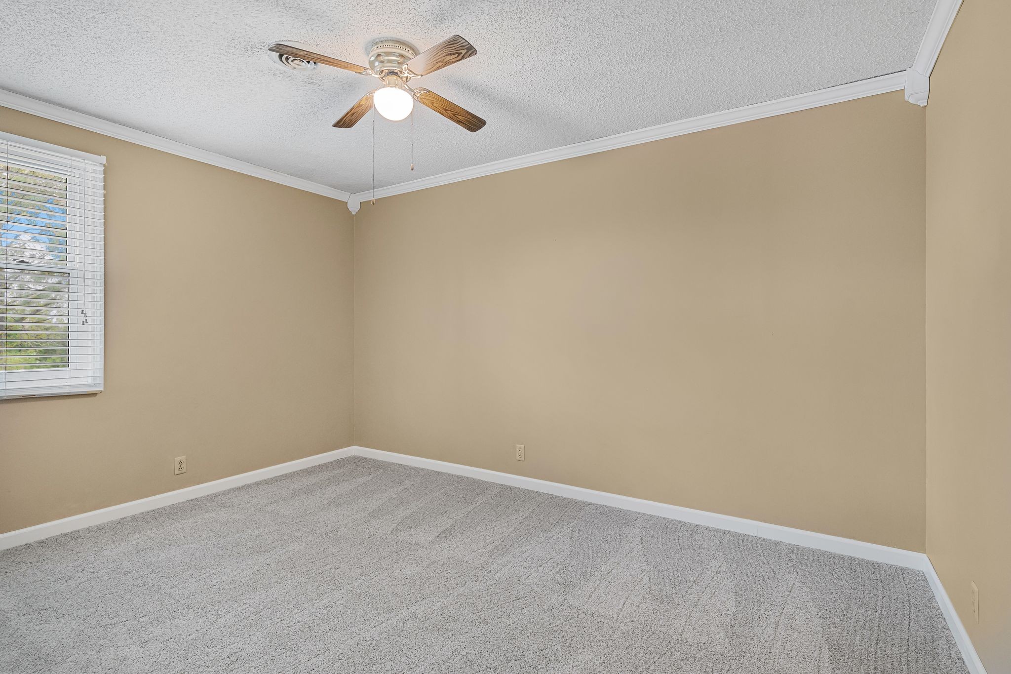 460 West Campbell Road Goodlettsville, TN 37072 - Photo 15 of 55 an empty room with a window and a fan