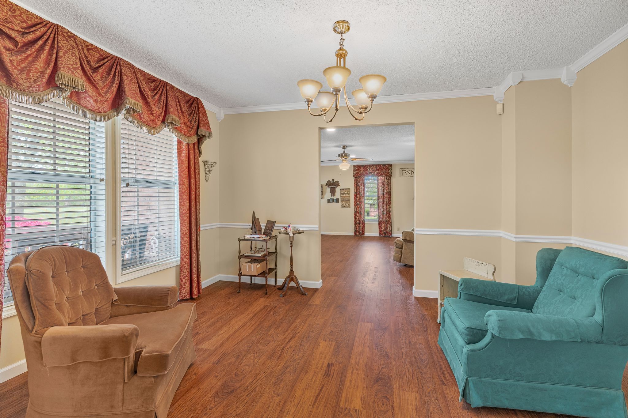 460 West Campbell Road Goodlettsville, TN 37072 - Photo 21 of 55 a living room with furniture dining table and a chandelier