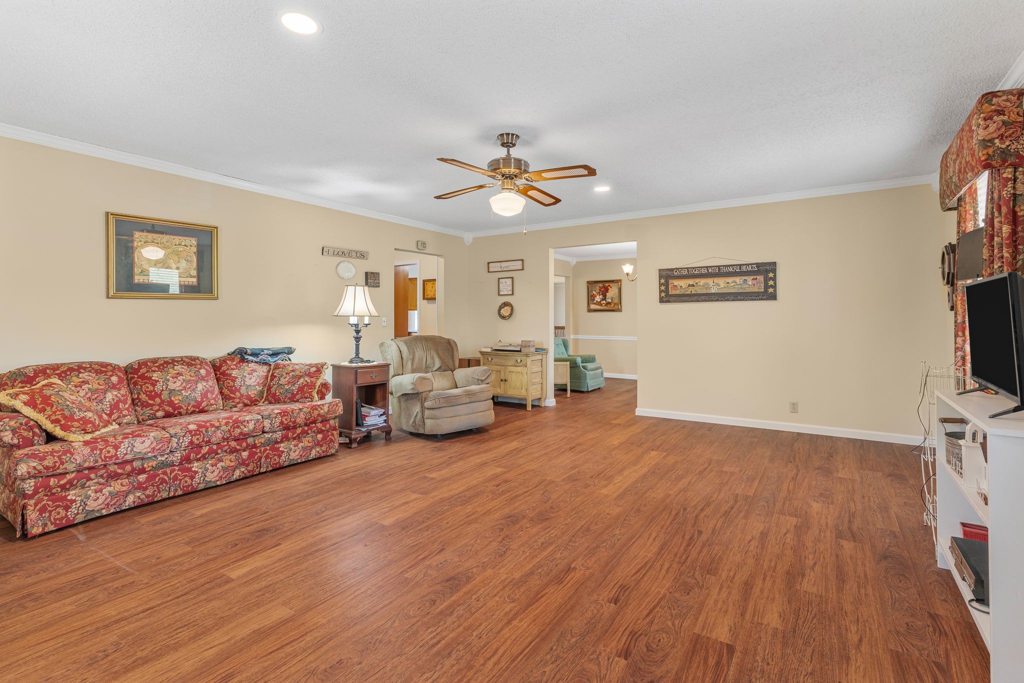 460 West Campbell Road Goodlettsville, TN 37072 - Photo 24 of 55 a living room with furniture a flat screen tv and a fireplace