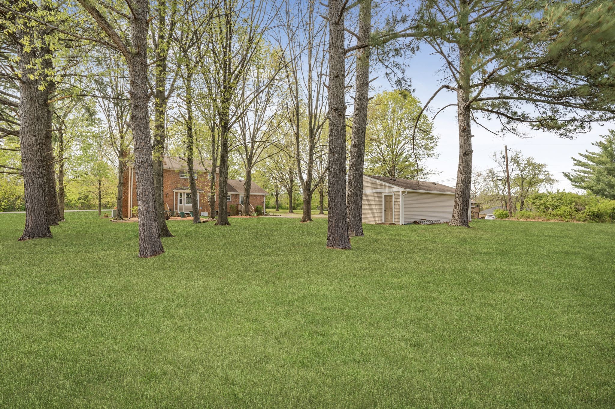 460 West Campbell Road Goodlettsville, TN 37072 - Photo 41 of 55 a backyard of a house with lots of green space and fountain