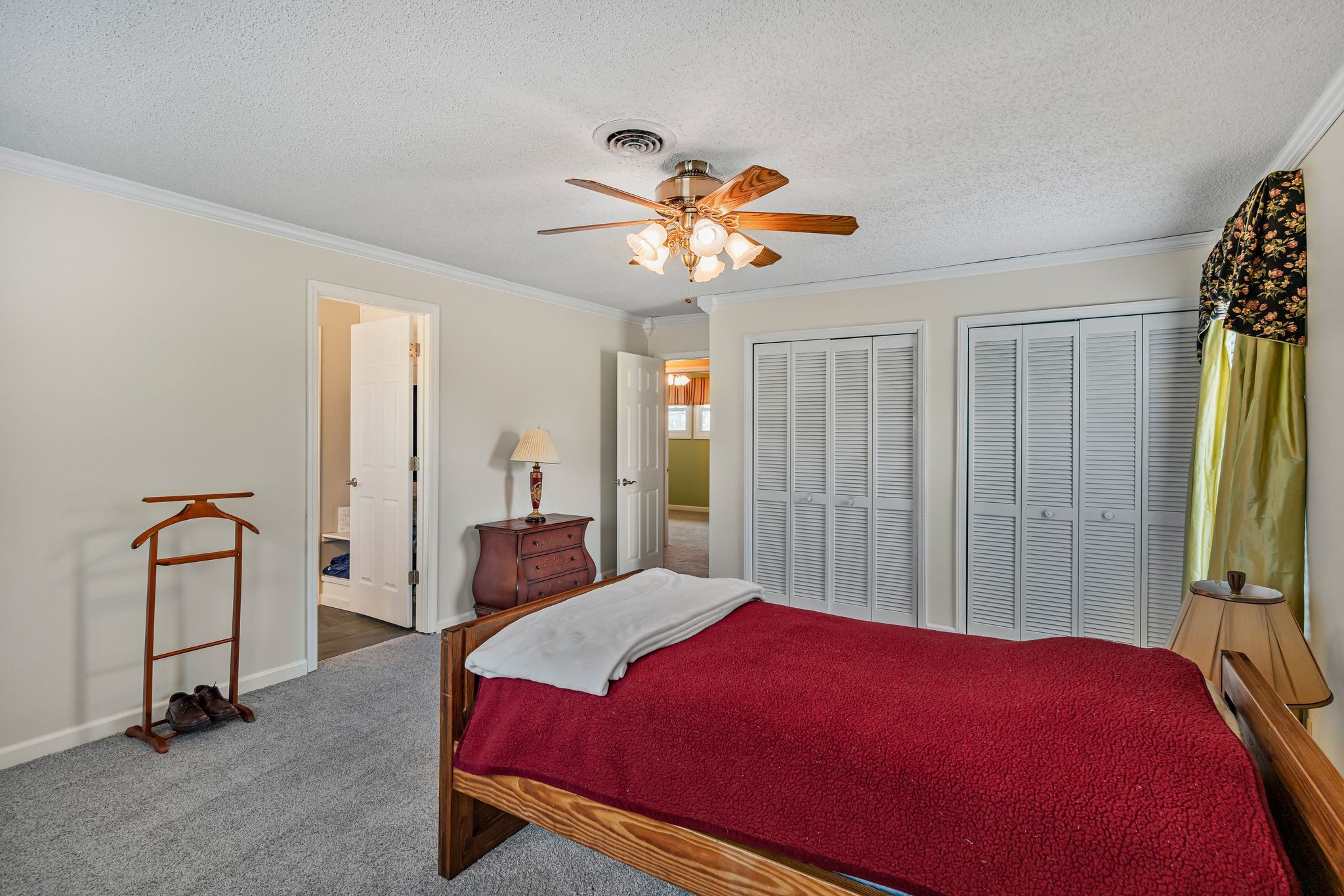 460 West Campbell Road Goodlettsville, TN 37072 - Photo 10 of 55 a bedroom with a bed and a chandelier
