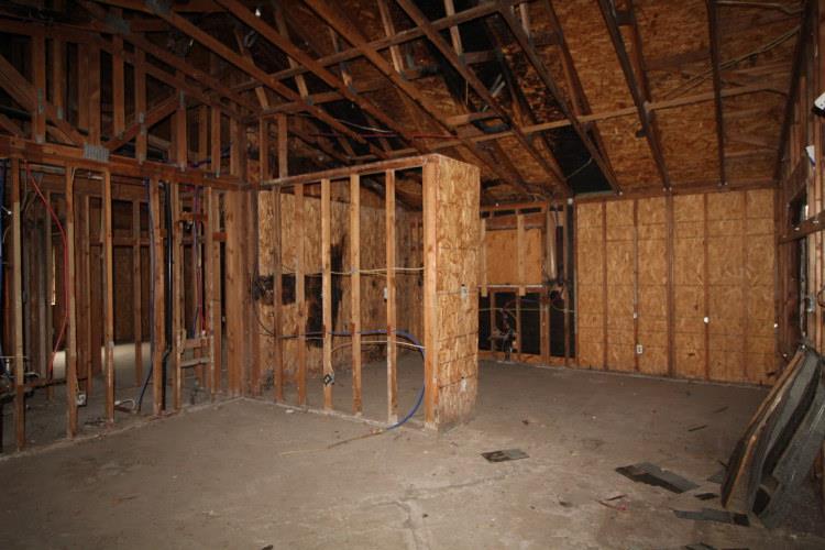 661 Barbara Court Merced, CA 95341 - Photo 11 of 18 a view of an empty room with wooden walls