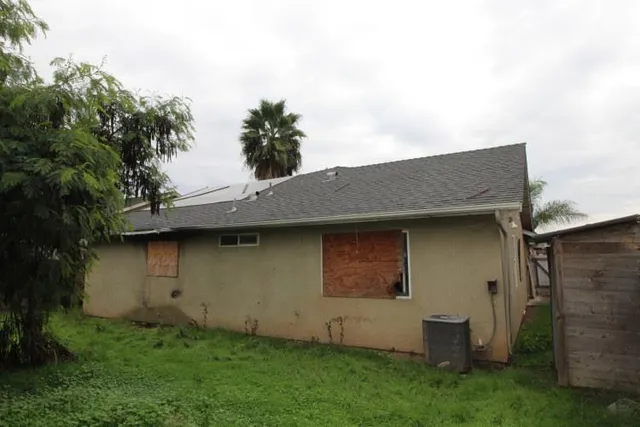 a backyard of a house with lots of green space