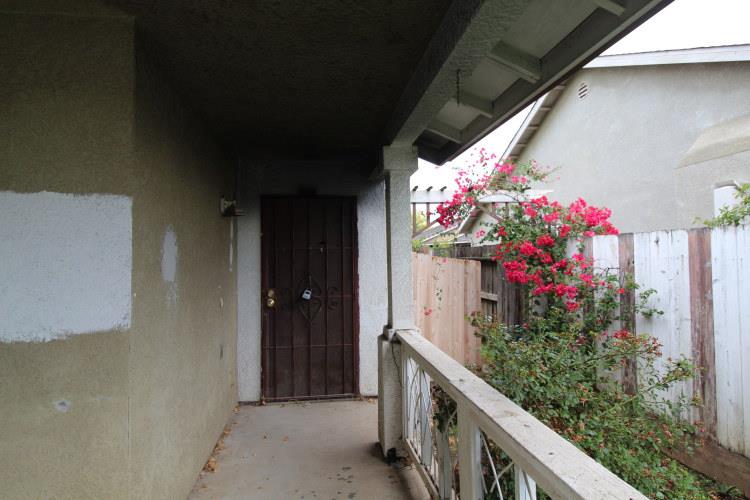 661 Barbara Court Merced, CA 95341 - Photo 5 of 18 a view of a house with a flower garden