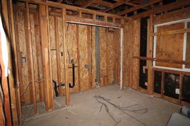 a bathroom with a shower and a tub
