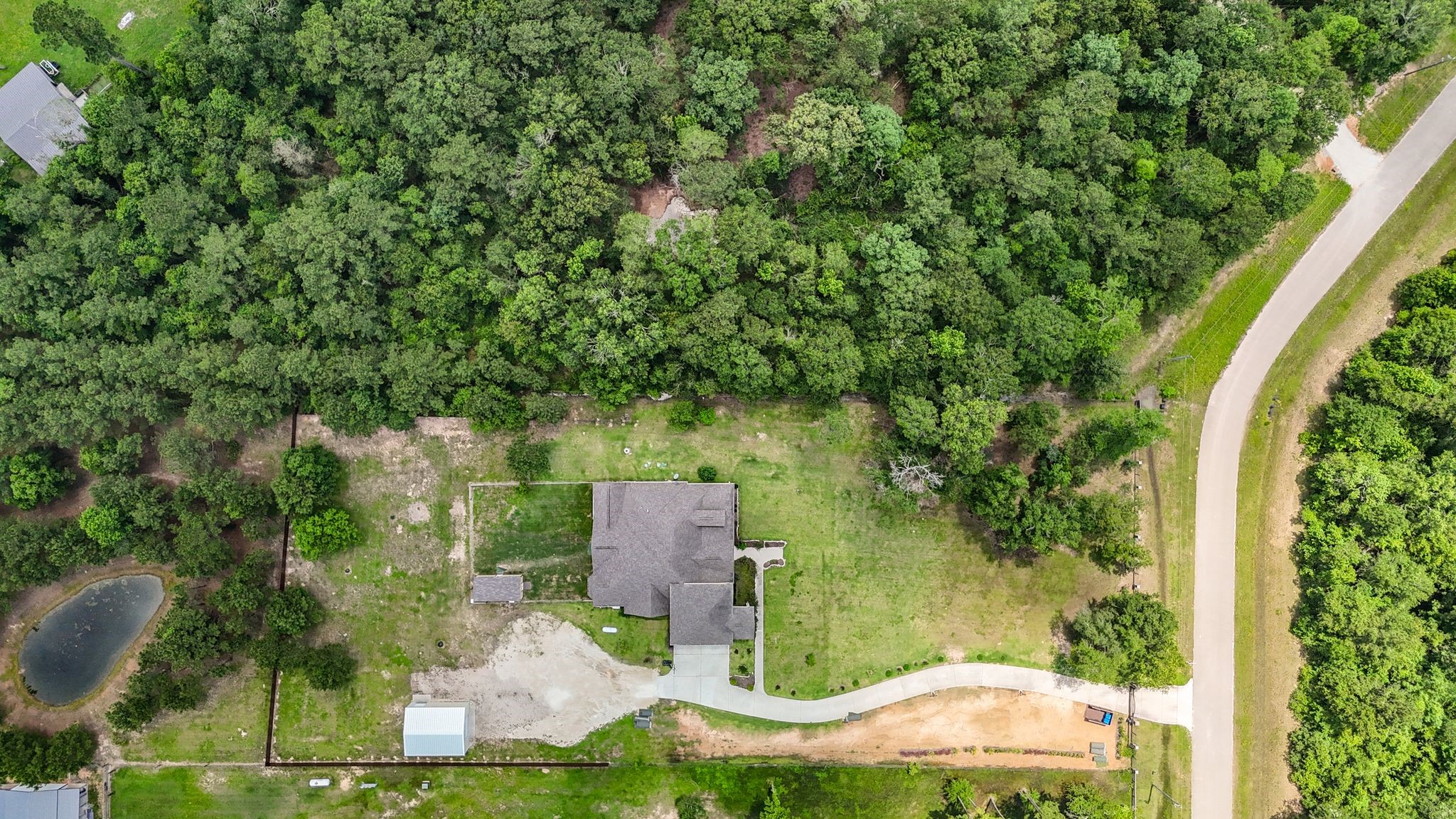 21038 Angus Drive Cleveland, TX 77328 - Photo 49 of 49 an aerial view of a house with a yard