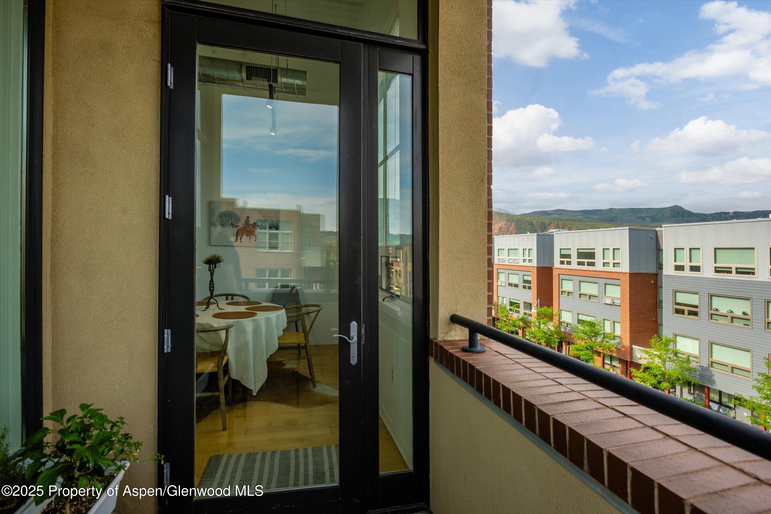 361 Robinson Street, Unit 308 Basalt, CO 81621 - Photo 19 of 23 a picture of a glass door with a balcony view
