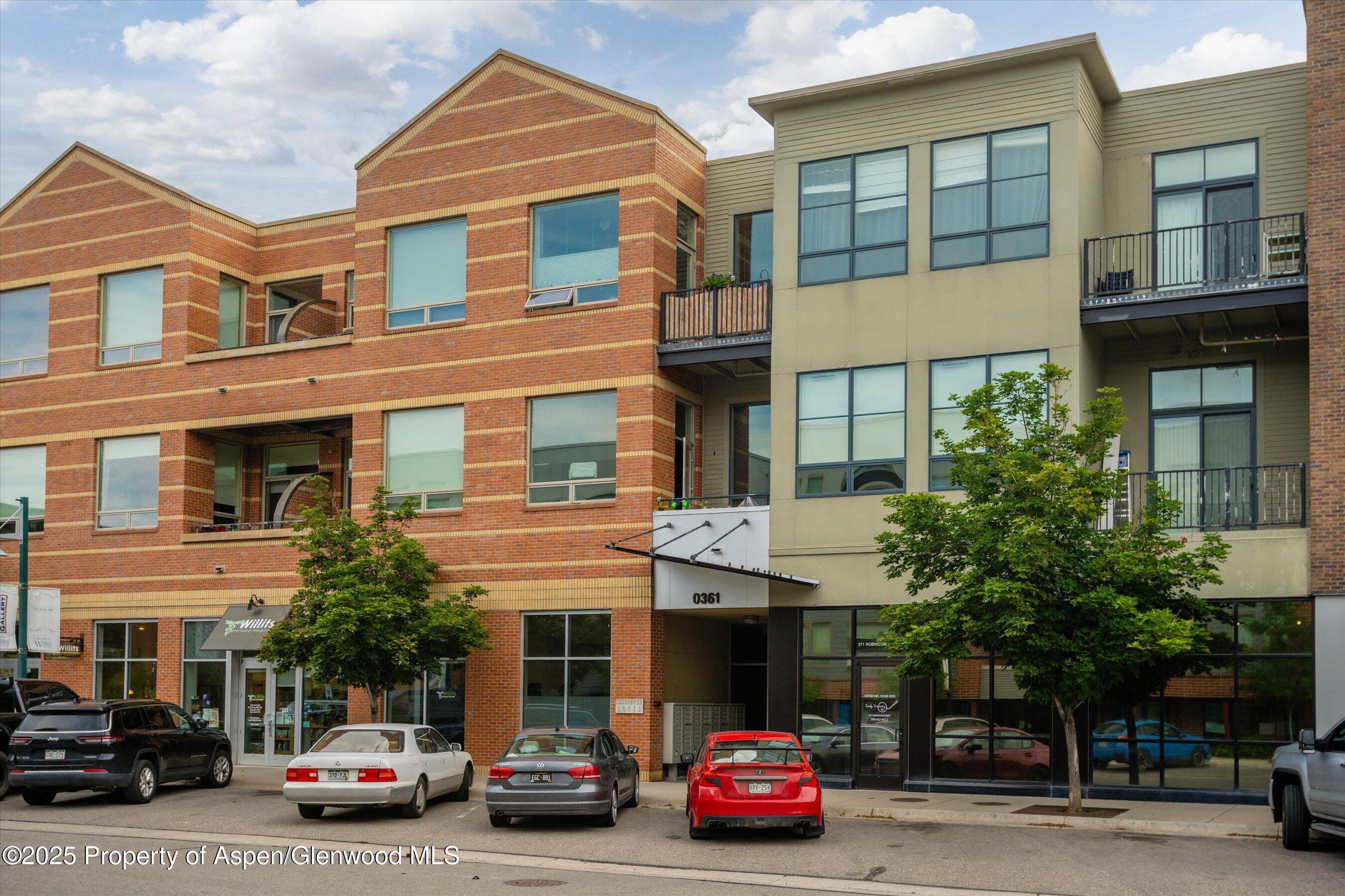 361 Robinson Street, Unit 308 Basalt, CO 81621 - Photo 3 of 23 a car parked in front of a building