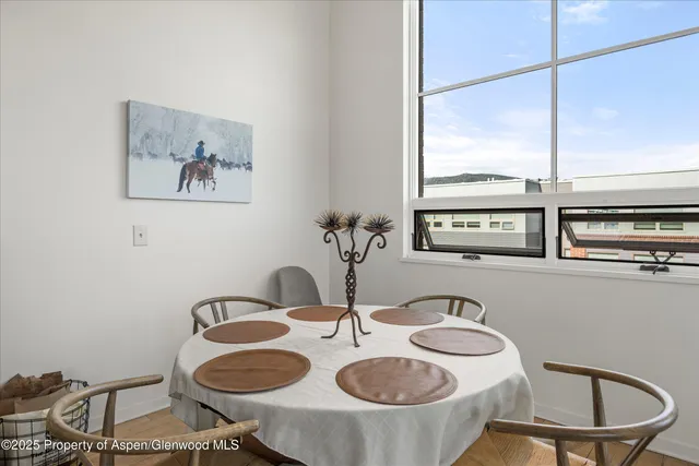 a kitchen with stainless steel appliances granite countertop a stove a refrigerator and a sink