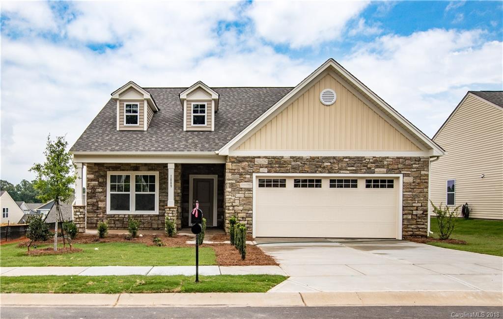 1889 Larkspur Way Tega Cay, SC 29708 - Photo 1 of 29 a front view of a house with a yard