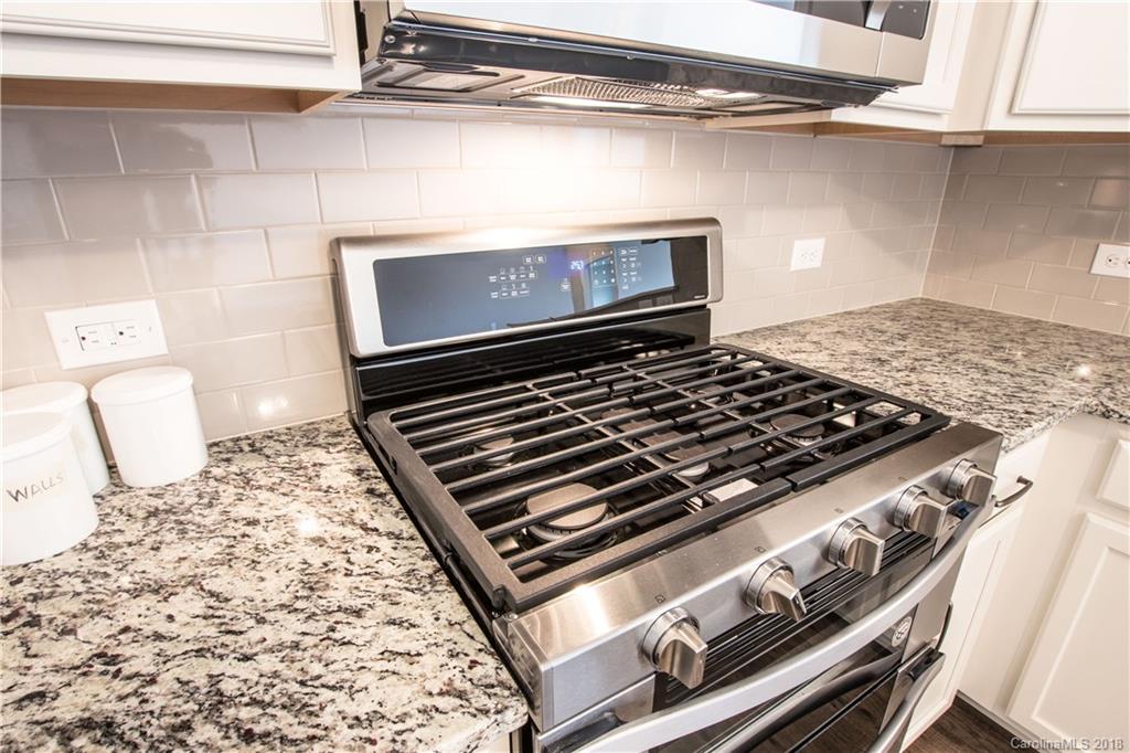 1889 Larkspur Way Tega Cay, SC 29708 - Photo 12 of 29 a close view of a stove