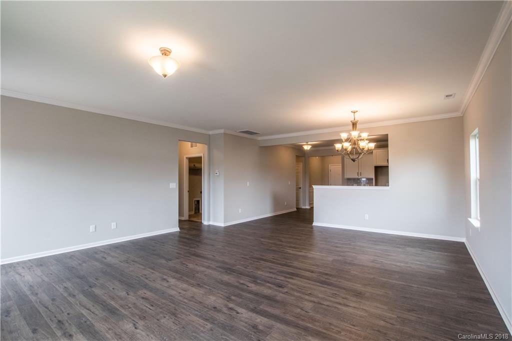 1889 Larkspur Way Tega Cay, SC 29708 - Photo 17 of 29 a view of a room with wooden floor