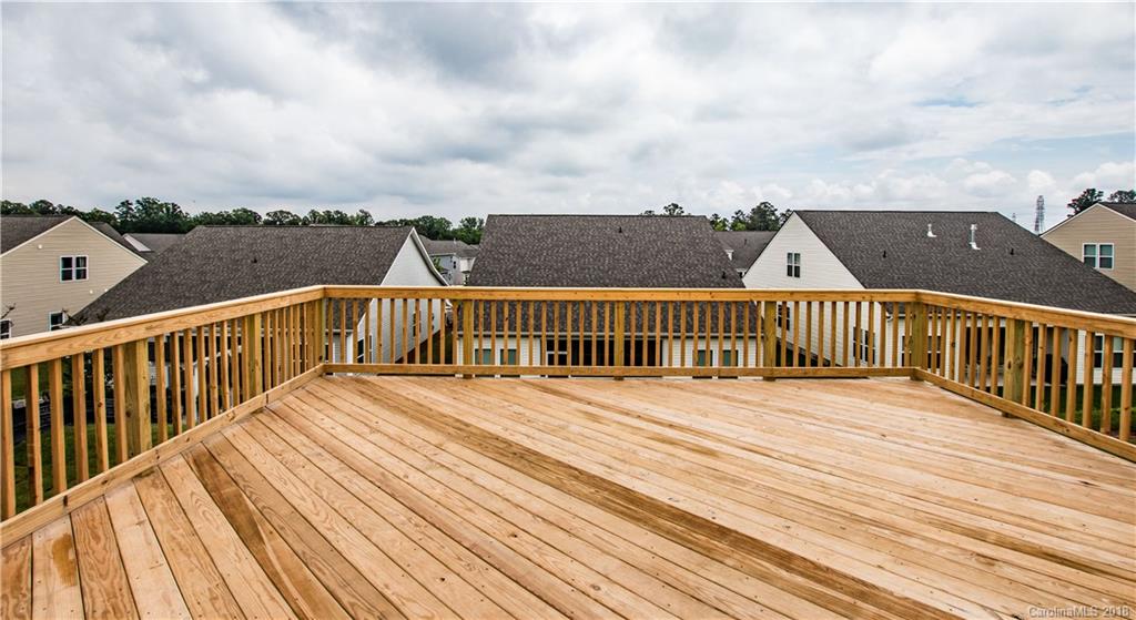 1889 Larkspur Way Tega Cay, SC 29708 - Photo 20 of 29 a view of balcony with wooden floor