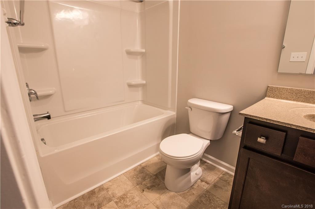 1889 Larkspur Way Tega Cay, SC 29708 - Photo 26 of 29 a bathroom with a toilet and a shower