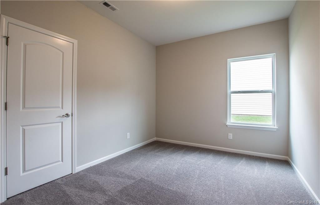 1889 Larkspur Way Tega Cay, SC 29708 - Photo 27 of 29 an empty room with a window