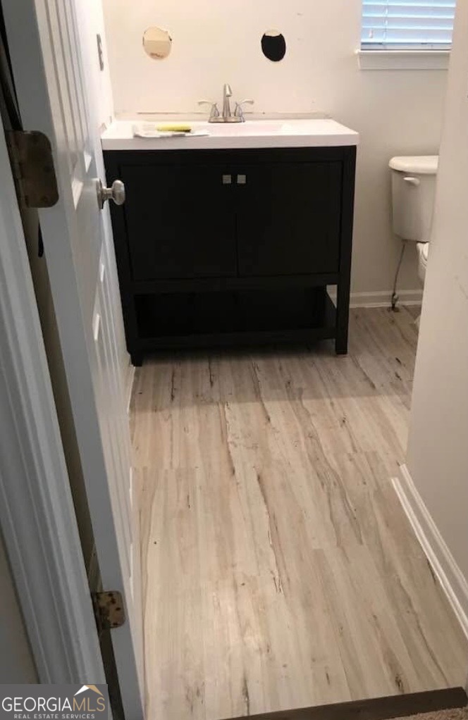 2851 Walden Lake Bend Decatur, GA 30035 - Photo 15 of 17 a bathroom with a sink and a toilet