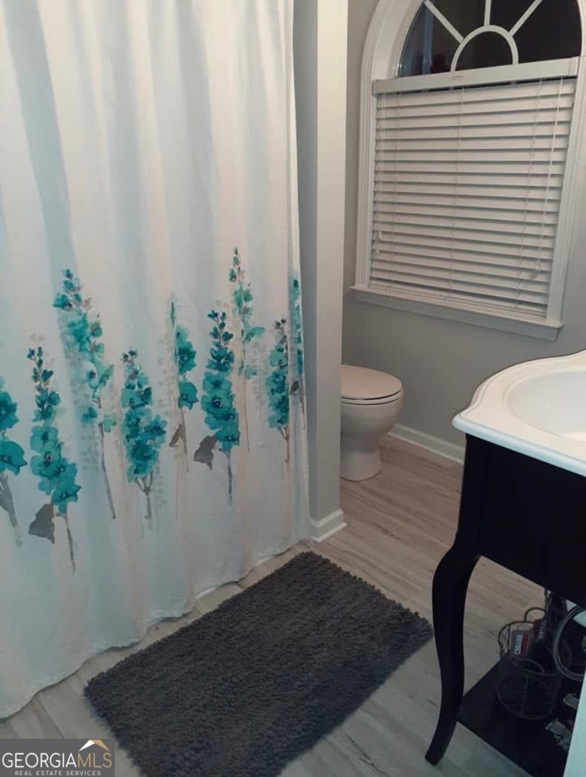 2851 Walden Lake Bend Decatur, GA 30035 - Photo 17 of 17 a view of a room that has a window and chair