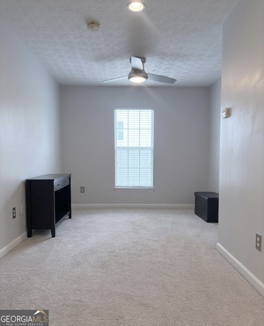 2851 Walden Lake Bend Decatur, GA 30035 - Photo 7 of 17 a view of an empty room with a window