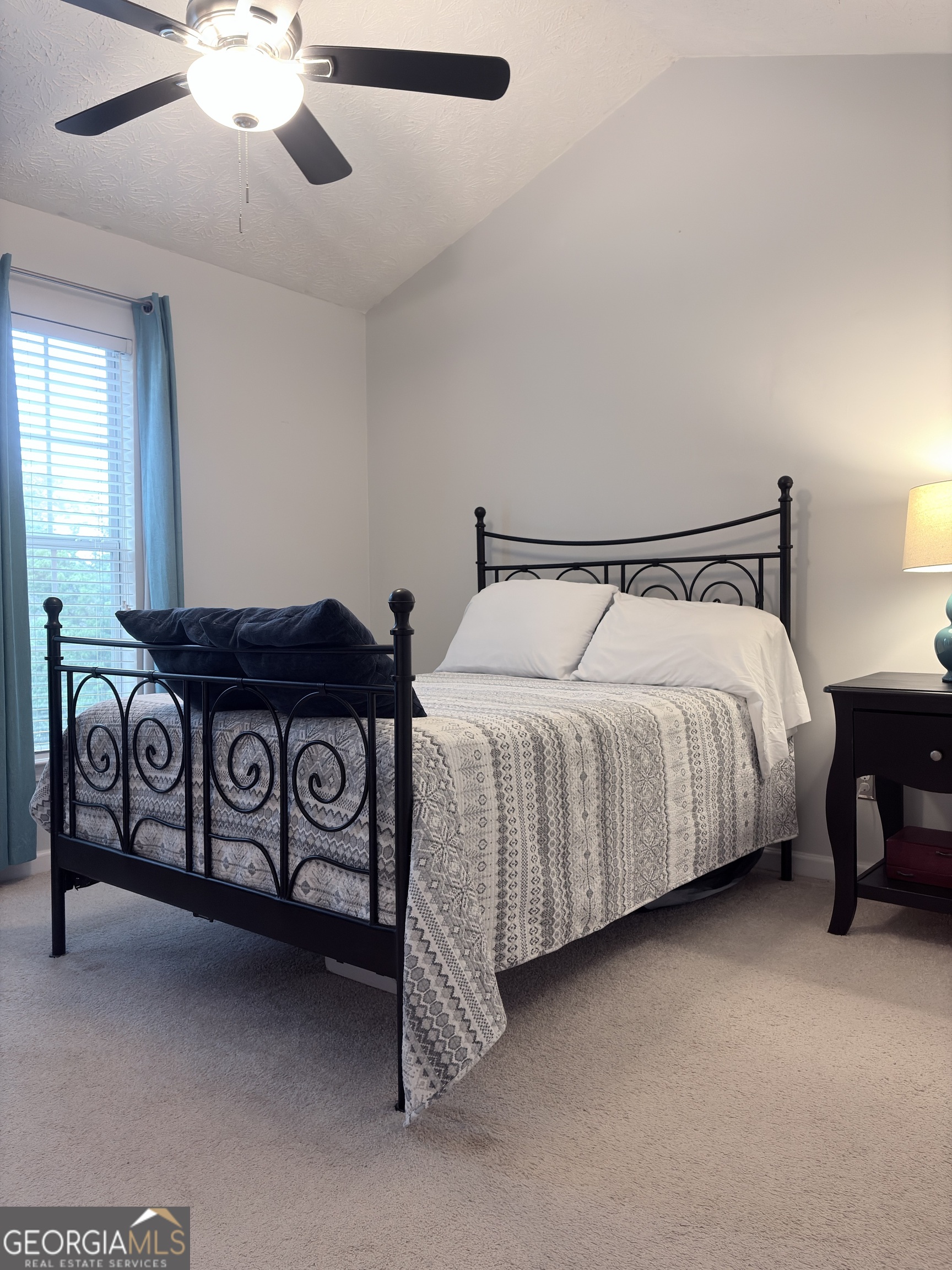 2851 Walden Lake Bend Decatur, GA 30035 - Photo 10 of 17 a bedroom with a bed and a table