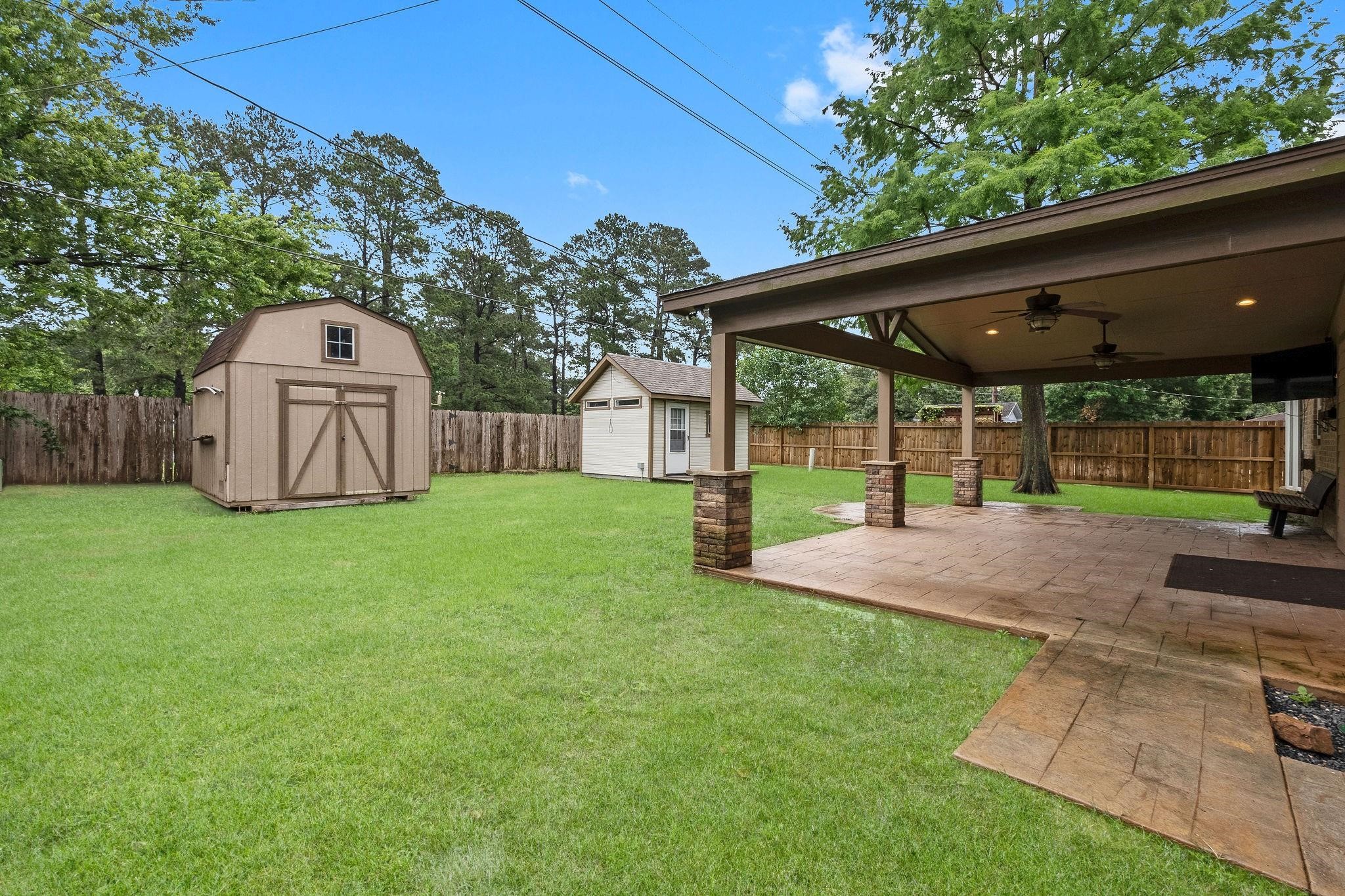 21710 Glenbranch Drive Spring, TX 77388 - Photo 30 of 32 a front view of a house with garden and porch